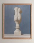Fine art print framed hanging on a wall. The print shown is of a painting of the statue of Veunus. with a blue background.
