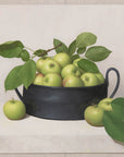 Fine art print of a still life painting of a black bowl of green apples with a light background.