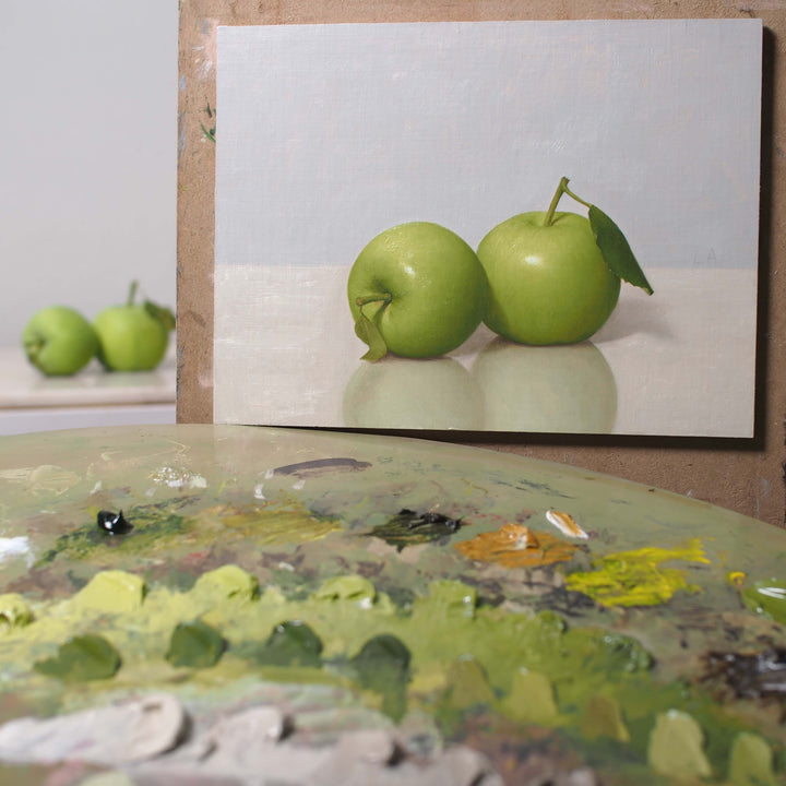 Still life painting of green apples