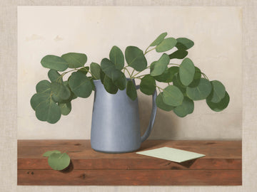 Fine art print of a painting of eucalyptus leaves in a blue vase with a light background.