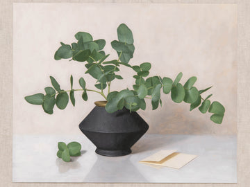 Fine art print of a still life painting of Eucalyptus in a black vase with a light background.